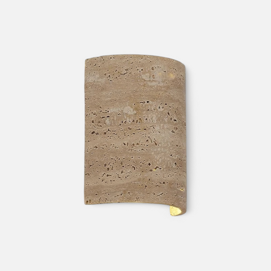 Travertine wall lamp IP65 in natural stone finish, showcasing minimalist wabi-sabi design for indoor or outdoor lighting use.
