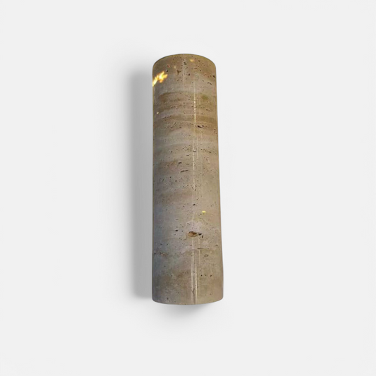 IP65 Travertine wall lamp in cylindrical shape, ideal for outdoor or indoor use with a minimalist wabi-sabi stone finish.