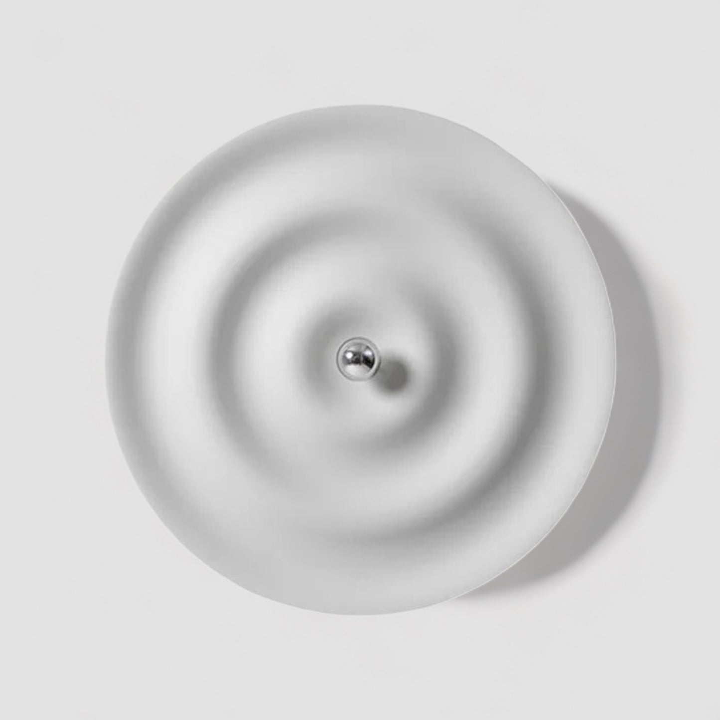 Modern round bedroom sconce