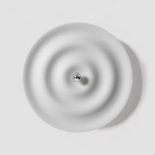 Modern round bedroom sconce