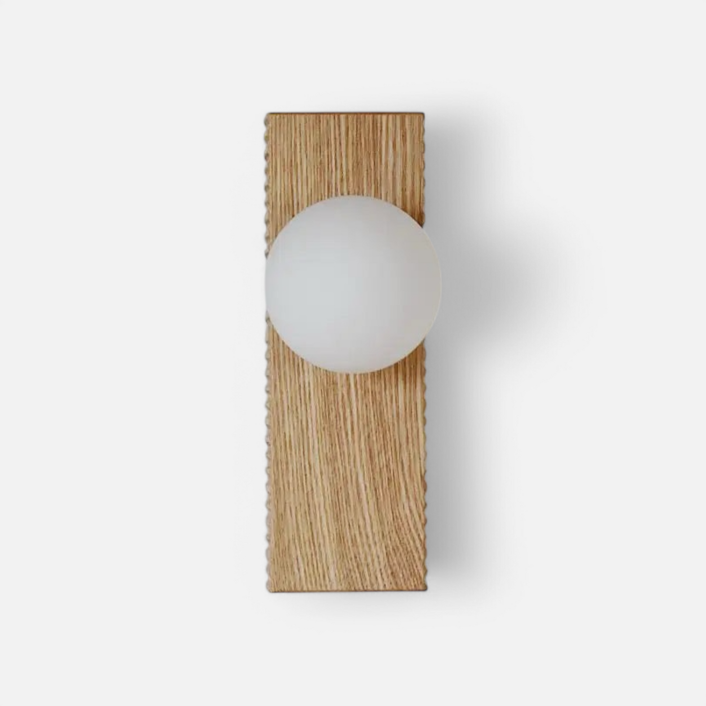 Rectangular wood wall lamp with frosted glass globe, ideal for modern bedroom lighting and minimalist interiors.