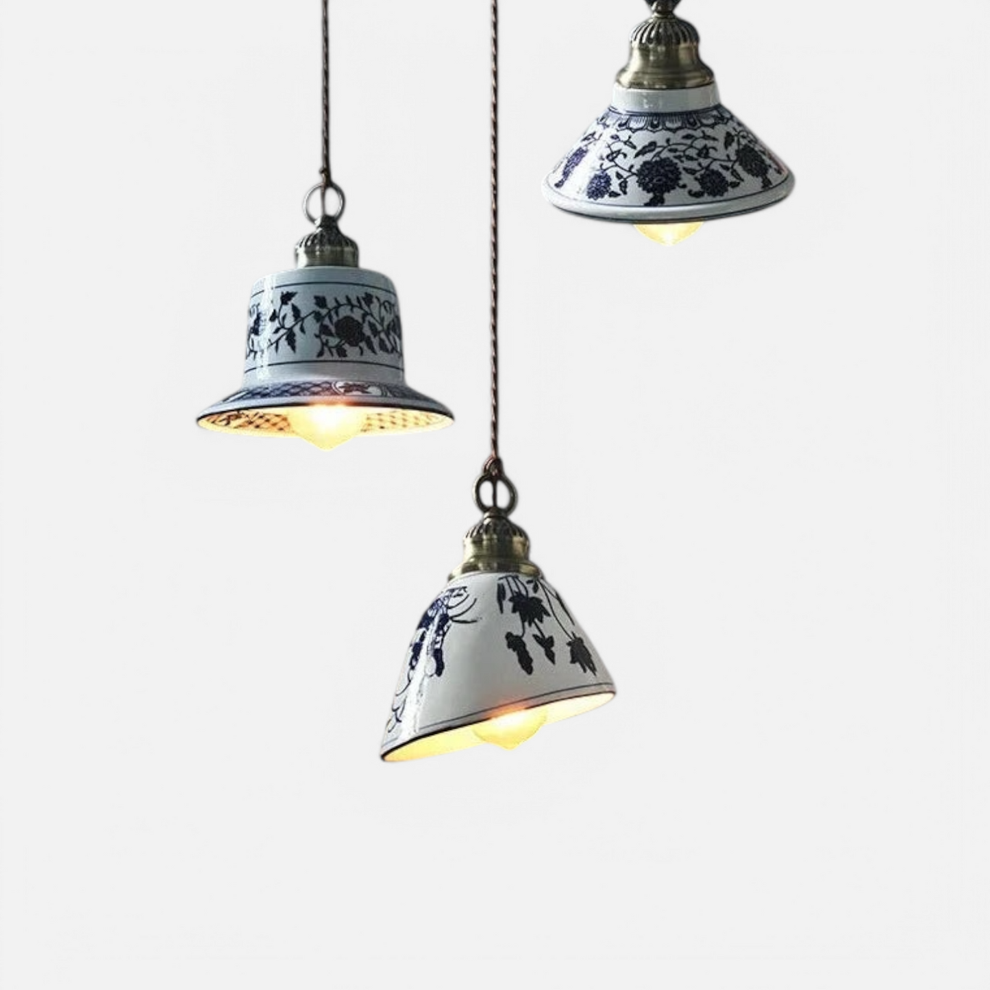Farmhouse ceramic pendant light trio with blue floral patterns and LED bulbs, ideal for dining room or kitchen lighting décor.