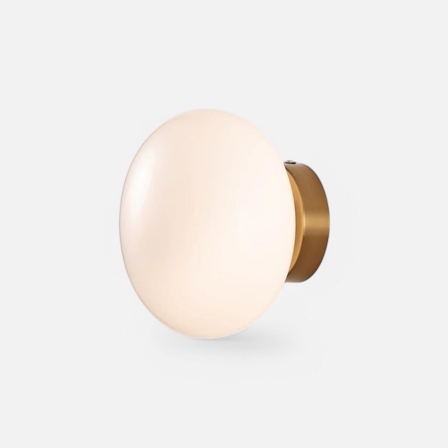 LUXELY modern ceiling and wall light with brass base, featuring a round opal glass shade and sleek minimalist design for versatile lighting.