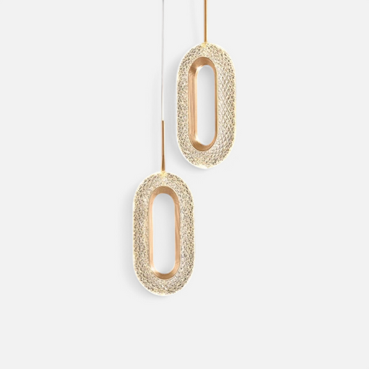 Modern Nordic pendant light with oval crystal design and gold accents, ideal for bedroom or living room ceiling lighting.