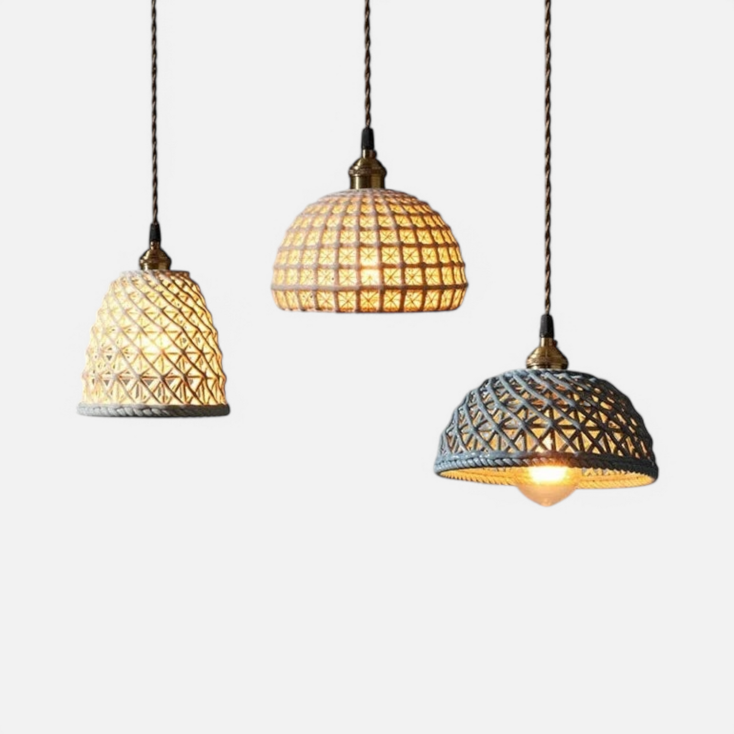 Set of three LUXELY white ceramic LED pendant light fixtures with intricate lattice design, ideal for dining room or kitchen pendant lighting.