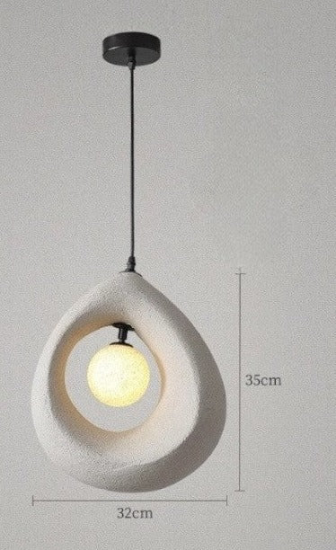 White art deco pendant light with LED bulb and minimalist teardrop design, perfect for modern dining or living room lighting.