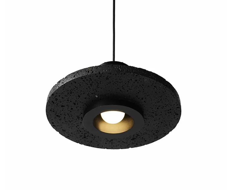 Bottom view of LUXELY black terrazzo pendant light with recessed bulb. Industrial ceiling fixture for ambient lighting.