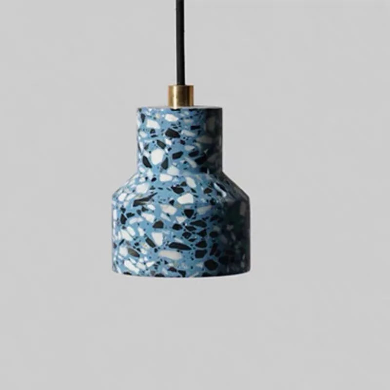 Single blue terrazzo stone pendant light by LUXELY with LED bulb and brass accent, ideal for kitchen or bar lighting.
