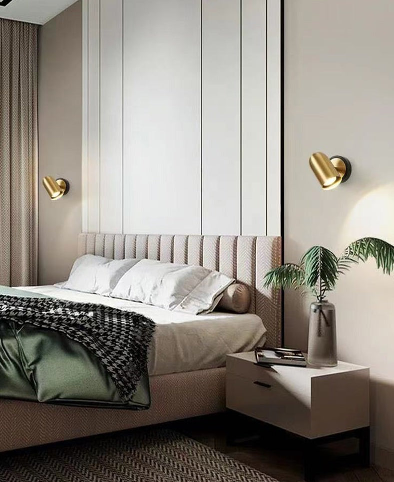 Lampe murale dorée réglable