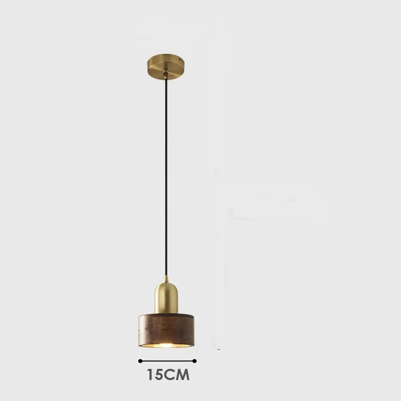 LUXELY pendant light with 15cm walnut wood shade and brass top, suspended from ceiling mount, ideal for modern interiors.