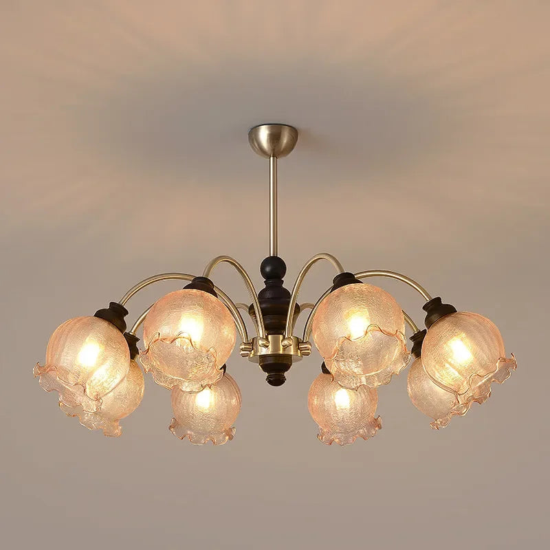 Modern crystal chandelier with LED lighting and floral glass design, featuring a black and gold frame for home and garden decor.