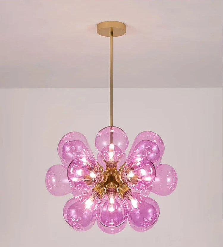 Purple Scandinavian glass chandelier with black lampbody, combining playful color with elegant Nordic design.
