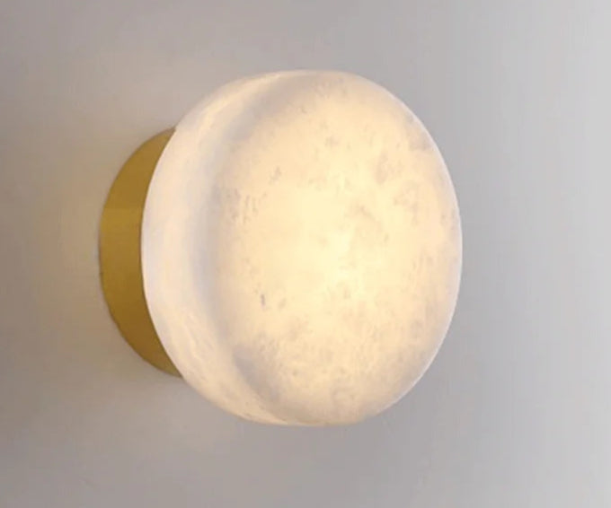 Modern LED Marble Wall Lamp with gold base, combining luxury and functionality for stylish corridor or living room lighting.