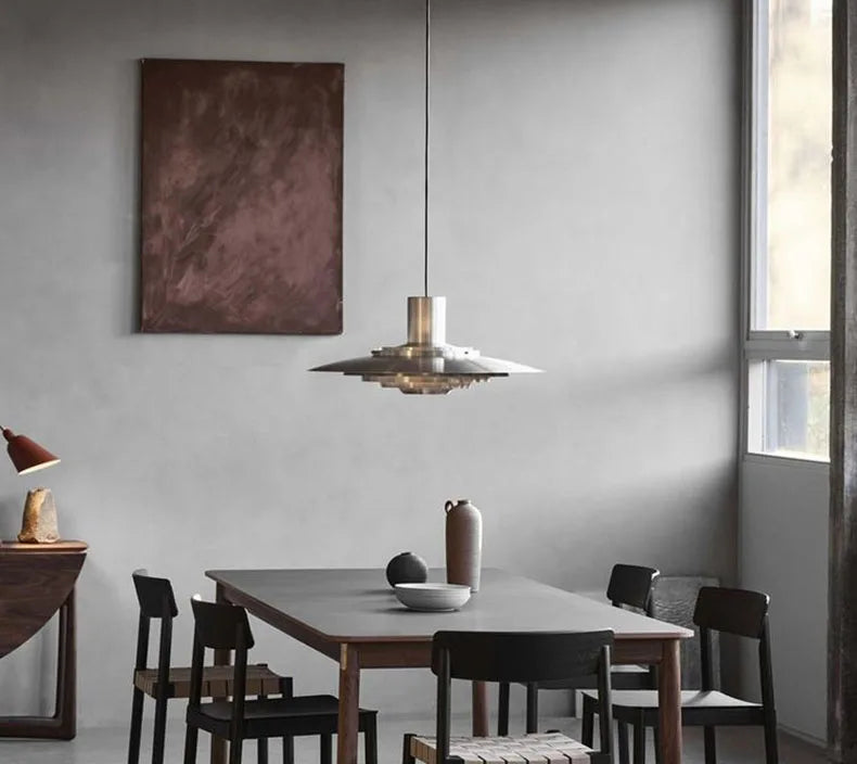Scandinavian-style dining room with Silver Cord Pendant Light - E27 Art Lamp, providing soft LED lighting and sleek metal design.