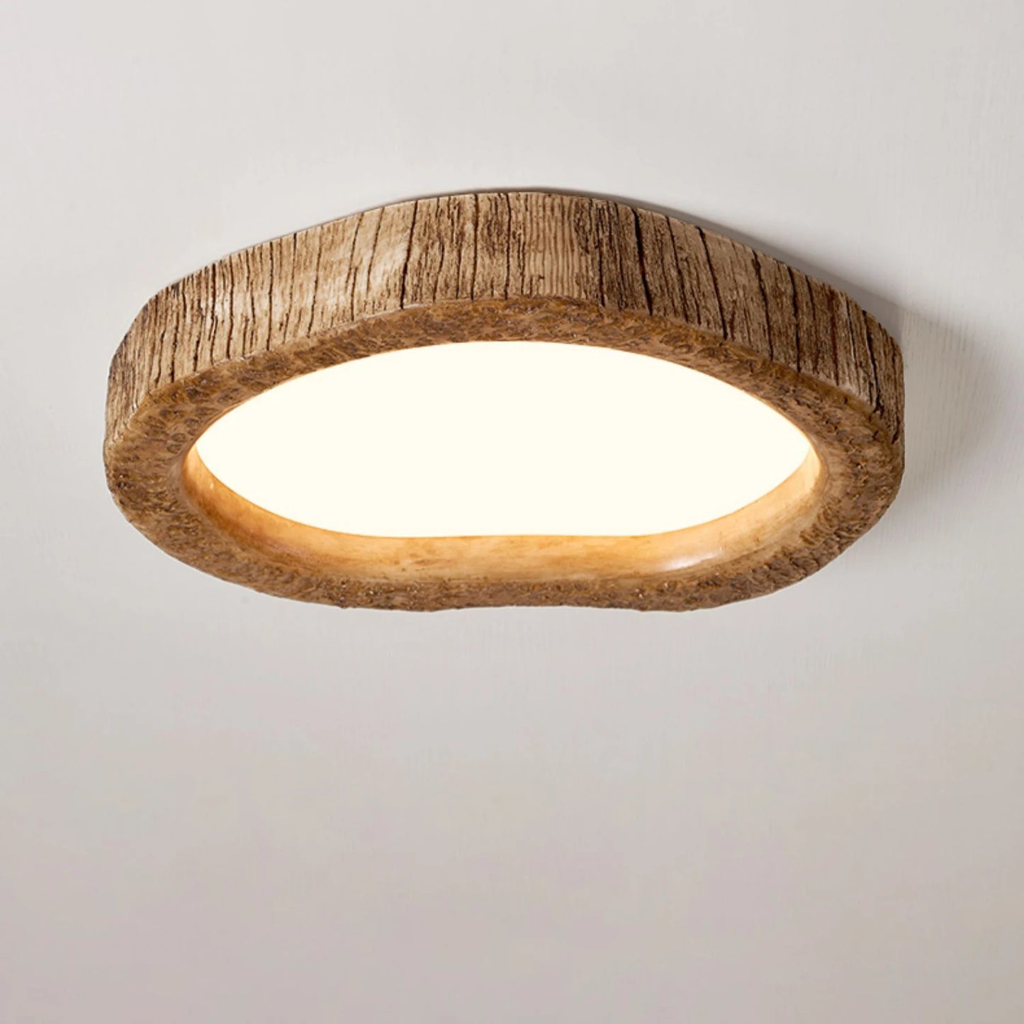 Modern wood lighting fixture by LUXELY mounted on ceiling, featuring a natural resin finish for Nordic bedroom or kitchen decor.