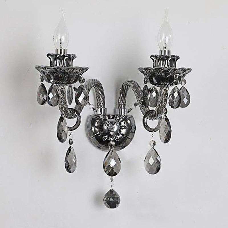 Dark chrome vintage lotus wall sconce with clear LED bulbs and crystal drops, ideal for sophisticated home lighting.