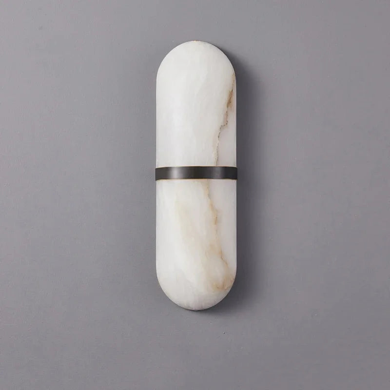 LUXELY oval wall sconce with real marble and dark iron accent, suitable for hallway or living room lighting fixtures.