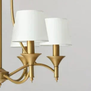 Close-up of white fabric shades on European retro chandelier with copper and iron frame, ideal for stylish pendant lighting.