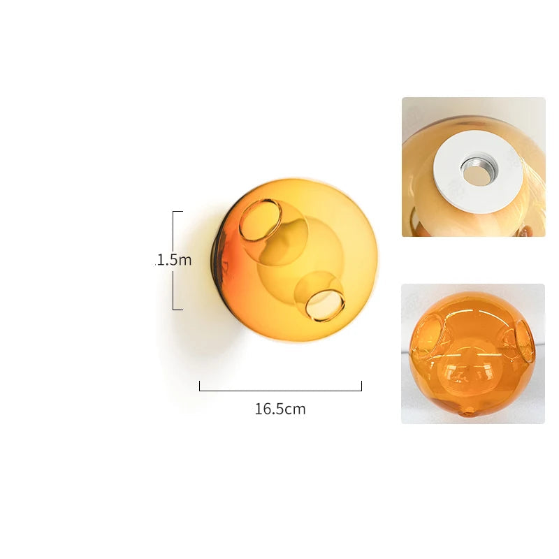 Orange glass LED wall light with Italian design, perfect for adding a warm, modern touch to bedroom or café interiors.