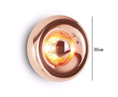 30cm copper art deco lava wall lamp with glowing LED center, suitable for bedroom or hallway lighting.