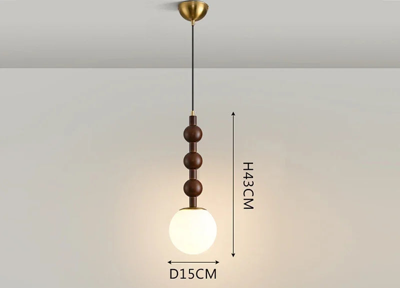 Minimalist Nordic Pendant Light with frosted glass globe and wood stem, ideal for LED lighting in compact spaces.