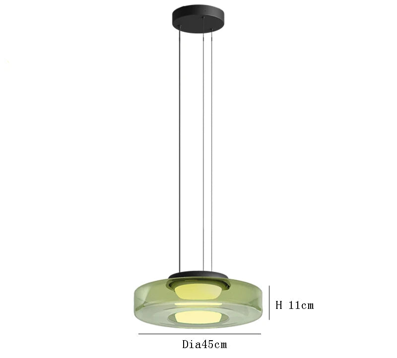 Green glass pendant light with 45cm diameter and 11cm height. Adjustable 150cm wire and LED source for kitchen or dining decor.