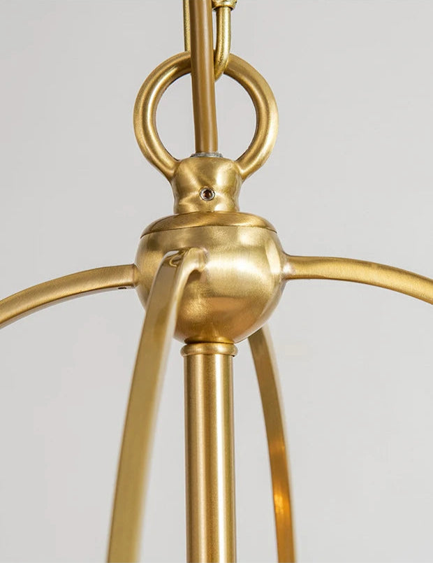 Top detail of American luxury chandelier showing gold suspension and LED fixture, ideal for upscale interior lighting.