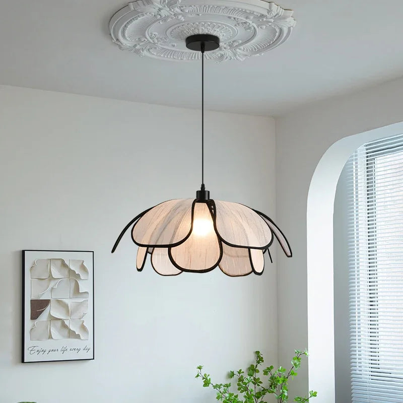 Modern Art Hanging Lamp with black iron frame and petal-shaped cloth shade, perfect Nordic pendant light for minimalist interiors.