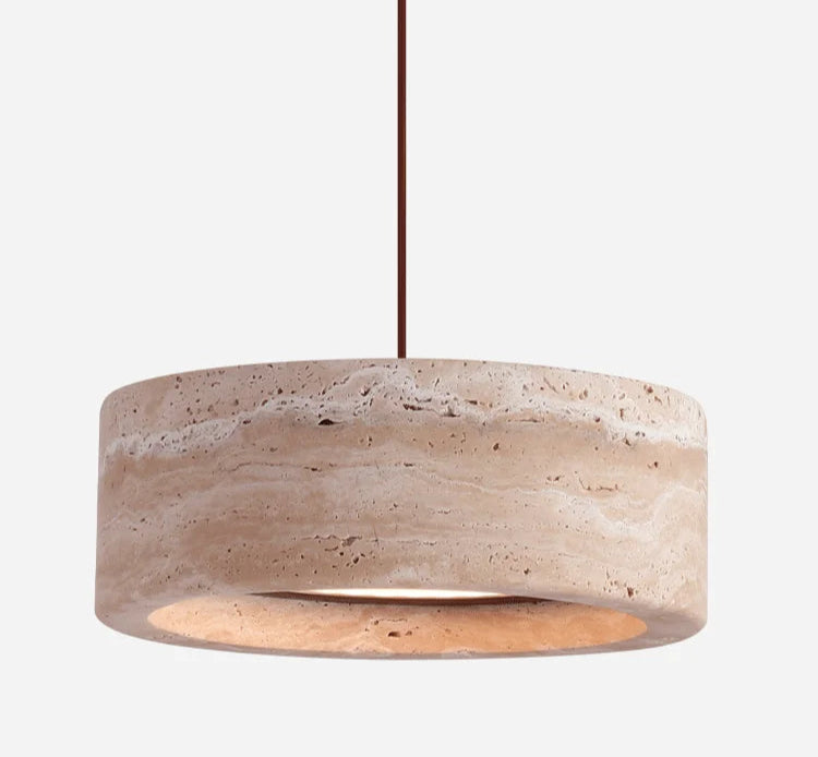 Travertine Retro Pendant Light turned on, emitting a warm LED glow through its stone body, perfect for cozy bedroom lighting.