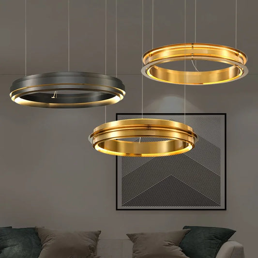 Minimalist modern ring chandelier in gold and black finishes, LED ceiling light ideal for living or dining room decor.