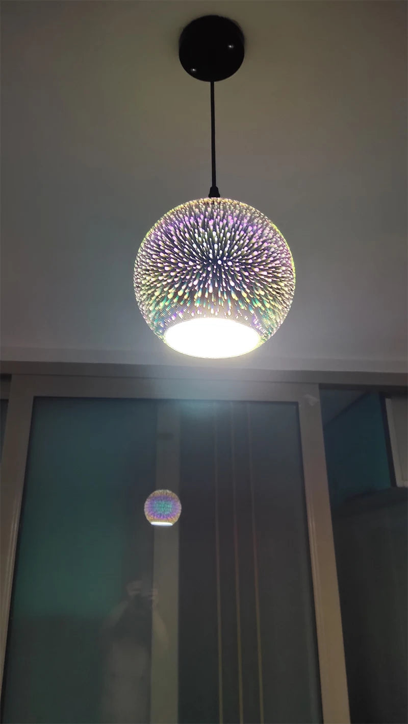 LED Fireworks Pendant Light with E27 socket and chrome finish, illuminating a room with colorful 3D glass burst effect.