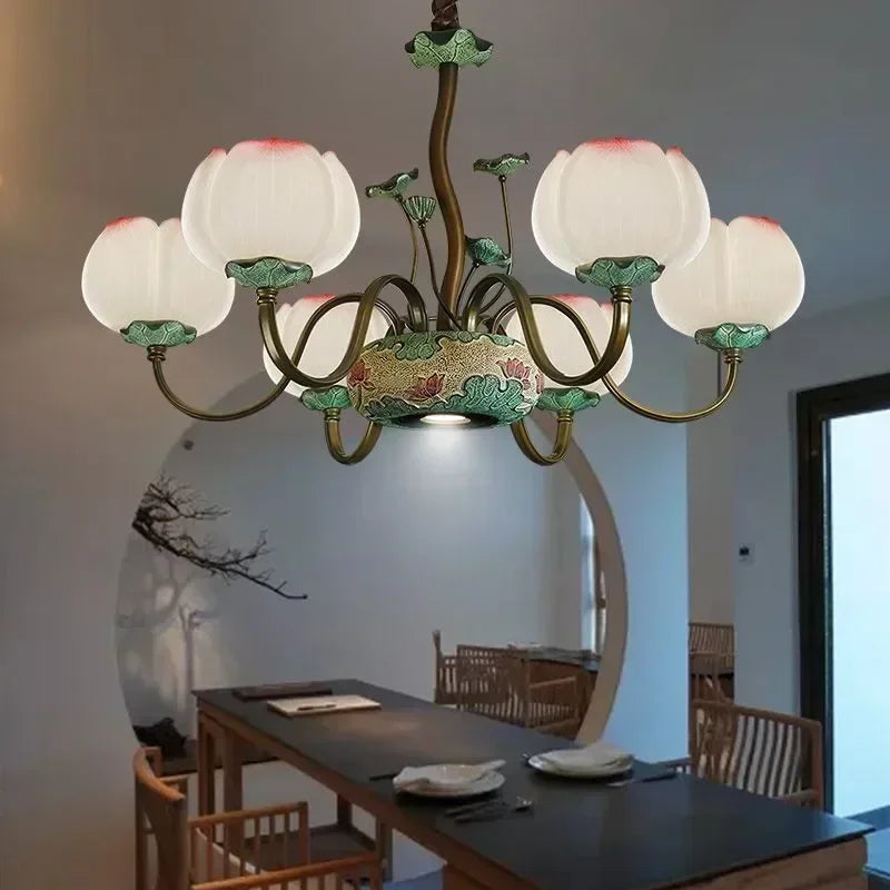 Creative chandelier with lotus blossom LED lights in a minimalist dining space, blending floral charm with modern design.