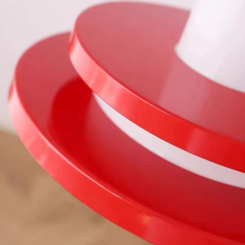 Close-up of the red glossy rings of the Nordic Retro LED Chandelier, emphasizing its high-quality vintage finish.
