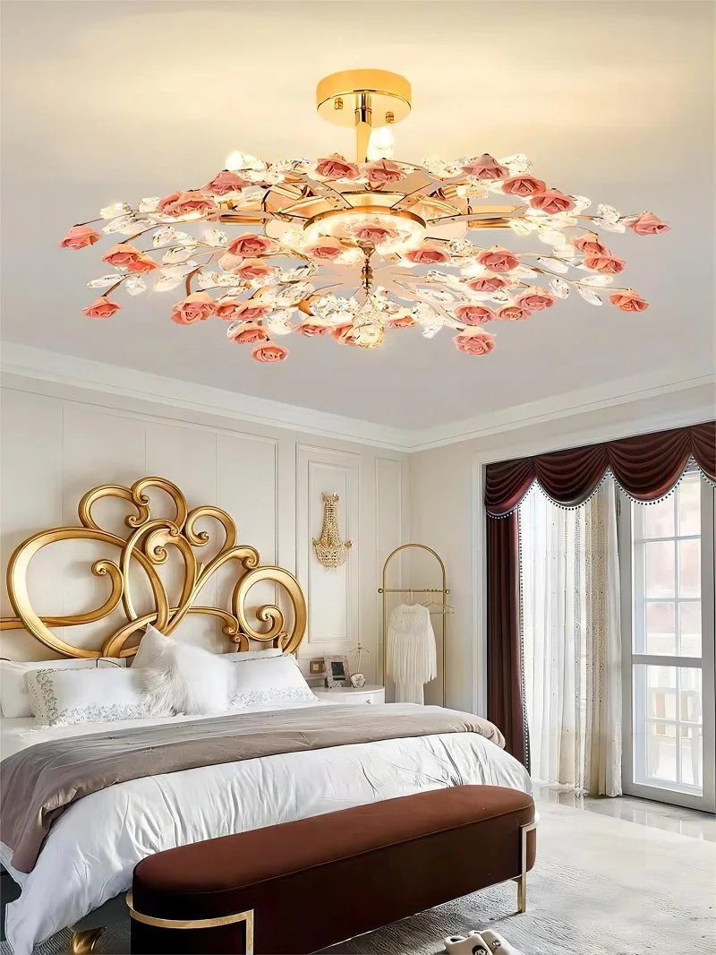 Romantic pink French ceramic flower chandelier with crystal details, luxury ceiling light for classic bedroom interiors.