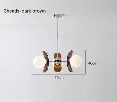 3-head dark brown Bauhaus retro chandelier with LED globes, 60cm wide and 40cm high, ideal for compact dining spaces.