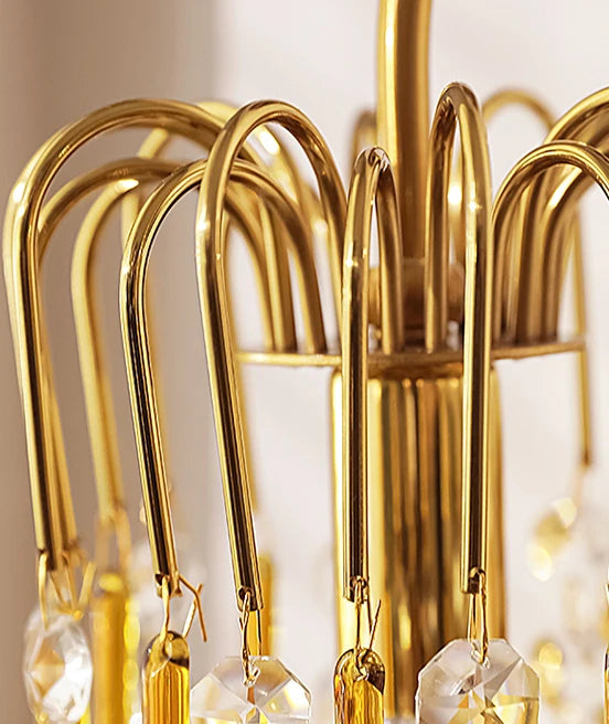 Close-up of copper hooks and crystal attachments on the Teardrop Crystal Wall Lamp, emphasizing retro French elegance.