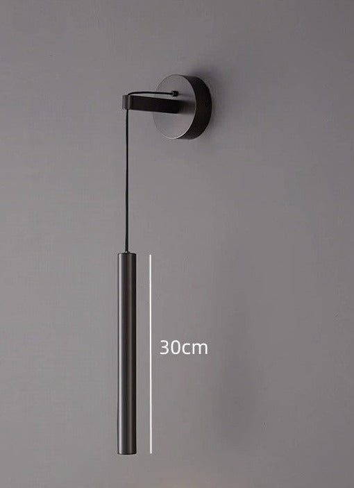 Adjustable bedside sconce