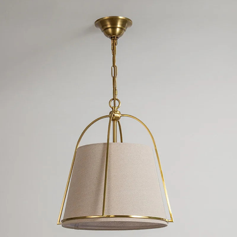 Minimalist postmodern chandelier in gold finish with fabric LED light, suitable for modern bedroom or hallway interiors.