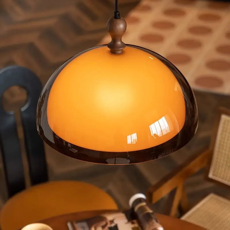 Top view of Modern LED Pendant Light with glossy amber dome, perfect for stylish kitchen or dining room decor.