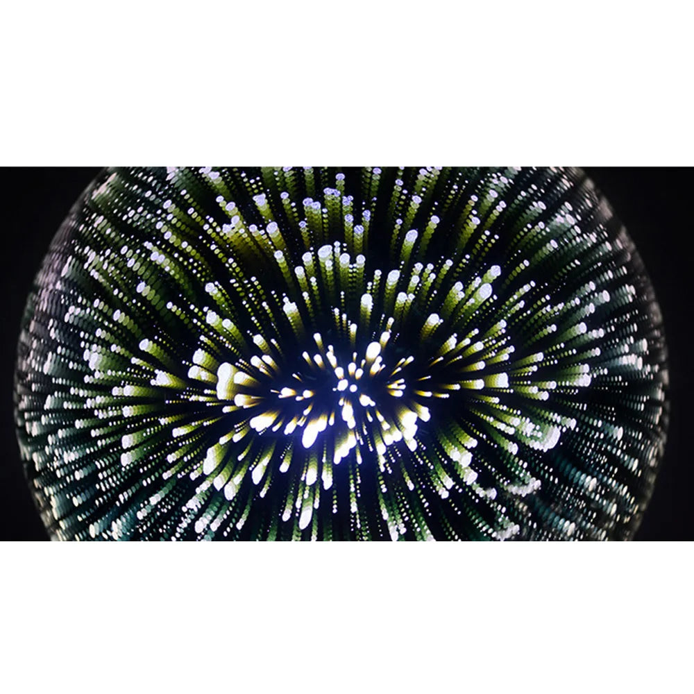 Close-up of the illuminated glass sphere pendant light, displaying the intricate fireworks 3D lighting effect from below.