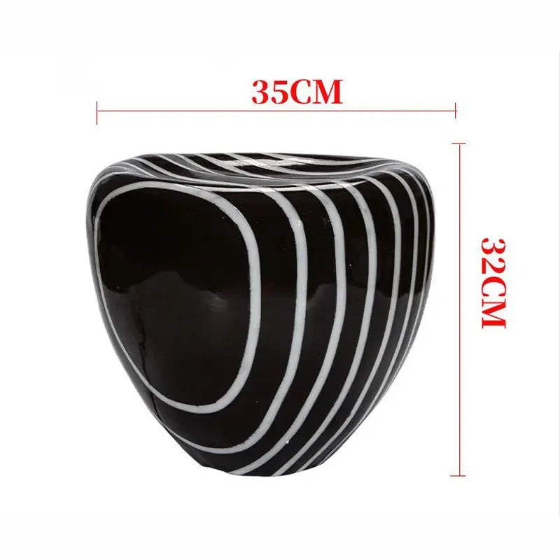 Dimensions of LUXELY stone garden light shown as 35cm wide and 32cm tall, ideal size for outdoor decorative lighting fixtures.