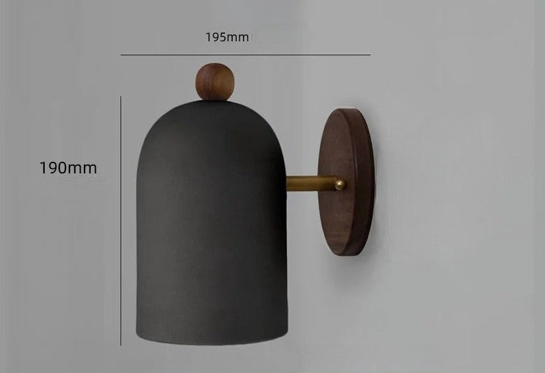 Black dome wall lamp with walnut wood base and top knob, measuring 195mm depth and 190mm height for stylish wall lighting.