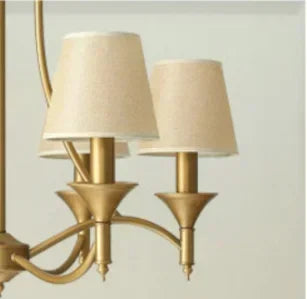 Close-up of beige fabric shades on European retro chandelier with gold finish, perfect for classic bedroom or living room lighting.