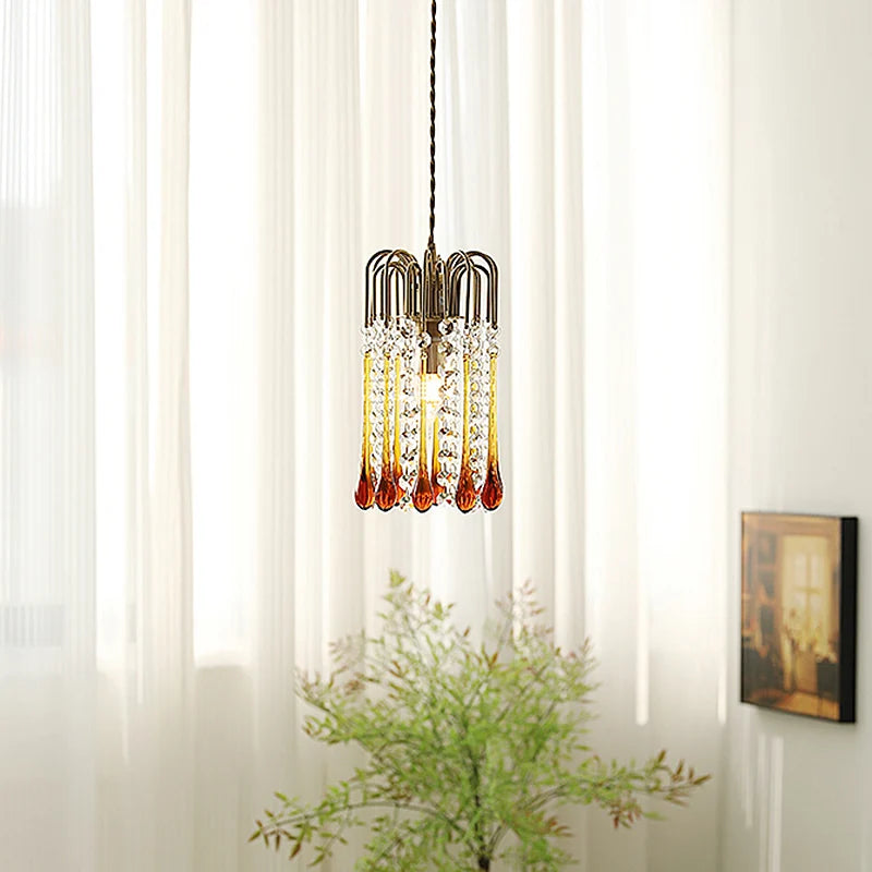 Small copper pendant light with vintage water drop glass design, perfect for cloakroom or home décor accent lighting.