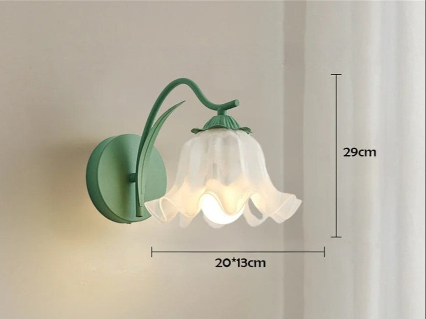 Green French flower sconce with glass shade shown with dimensions 29cm height and 20x13cm width, ideal for bedroom wall lighting.