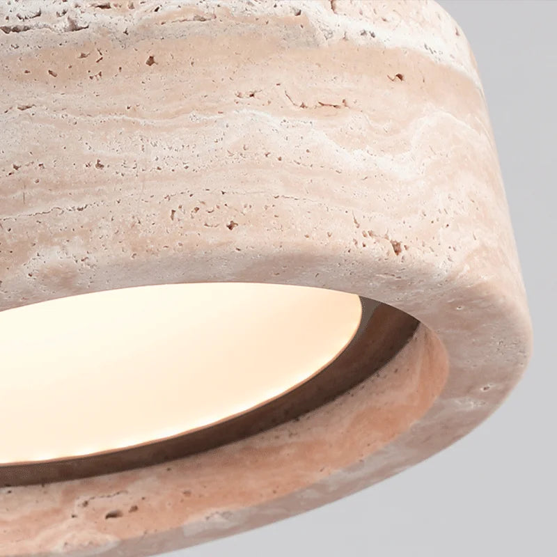 Close-up of Travertine Retro Pendant Light showing detailed stone texture and built-in LED light, ideal for stylish bedroom lighting.