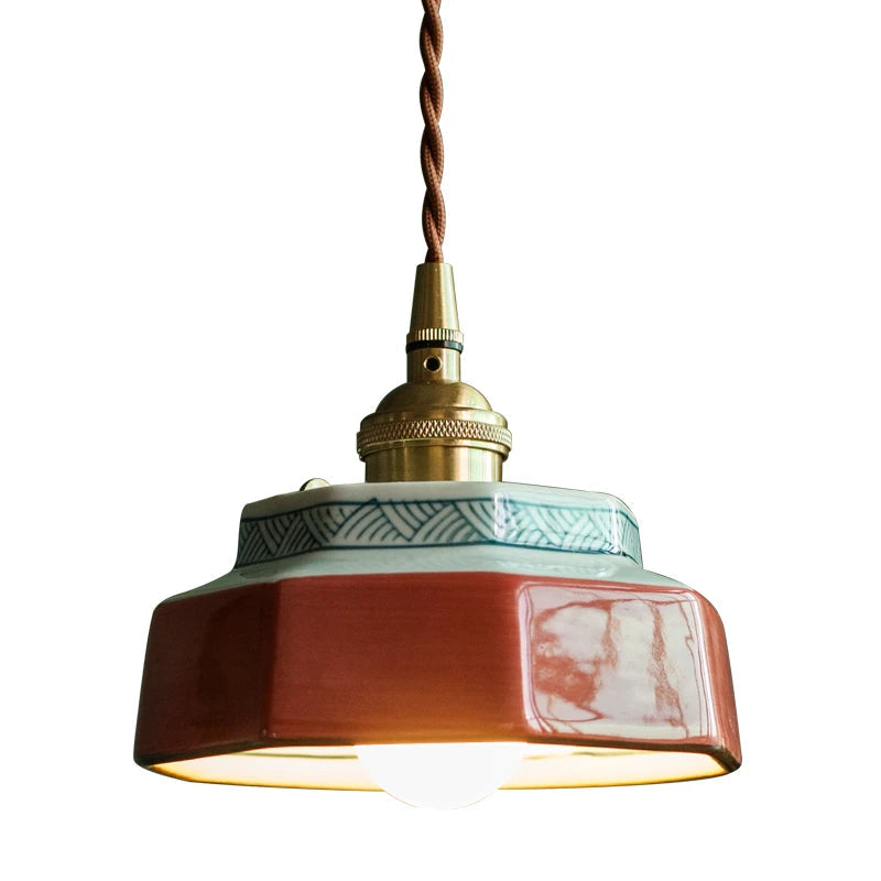 Vintage ceramic pendant lamp with copper finish and LED bulb, featuring hand-painted geometric trim for modern dining or living room lighting.