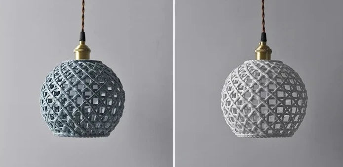 Blue and white spherical ceramic pendant lights by LUXELY, ideal for pendant coffee or restaurant lighting themes.