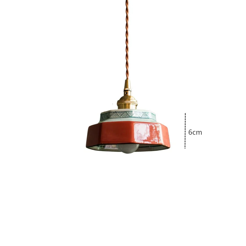 Glossy blue ceramic pendant lamp with LED bulb and brass fixture, 6cm tall, for elegant home lighting.