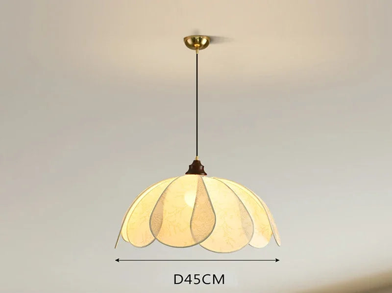 Modern Art Hanging Lamp with floral cloth shade and wood detailing, a Nordic pendant light for warm dining ambiance.